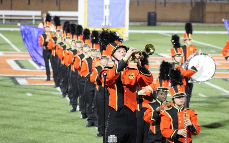 Pictured left, Connor Welch performs a solo on the trumpet during the Bulldog Band’s exhibition performance.