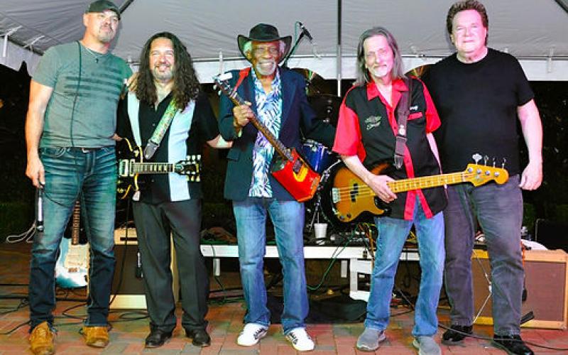 Mac Arnold (center) and his band Plate Full O’ Blues will perform at High Cotton Music Hall this Saturday. 