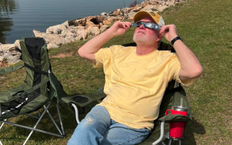 Hartwell native Ken Medlin propped up his lawn chair to take in the solar eclipse at the Hartwell Dam. 