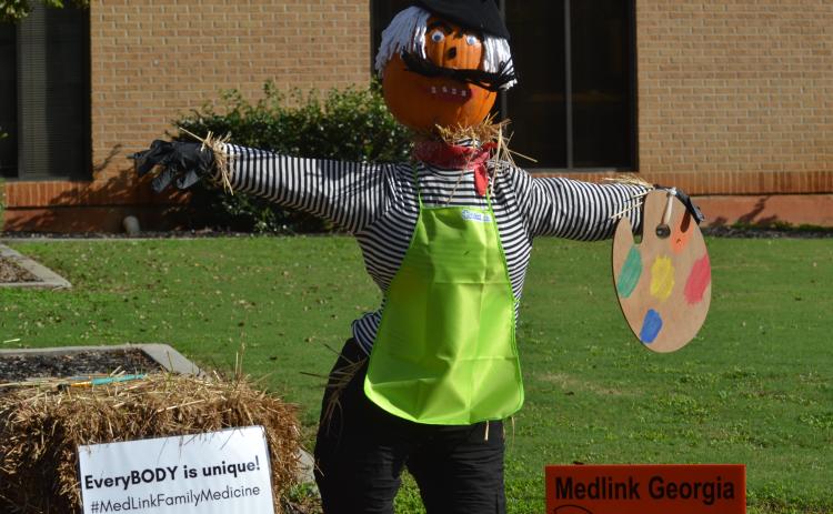 A scarecrow in front of the Hart County Courthouse.