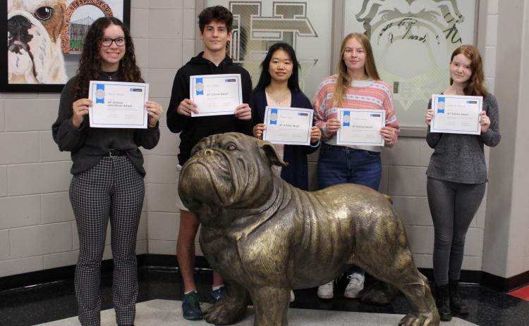 AP Scholar students (from left to right) Mary Elizabeth Jackson, Tate Phillips, Huong Pham, Cassidy Gaines, and Lindsey Waldvogle pose with their certificates. 