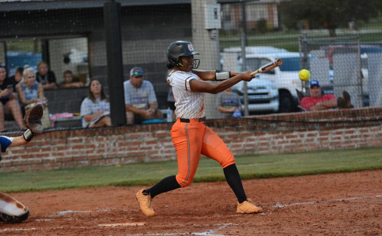 Senior infielder Jazz Shealer makes contact with the ball and picks up a hit against the Lady Tigers of Washington-Wilkes Aug. 24 in the 11-1 loss.