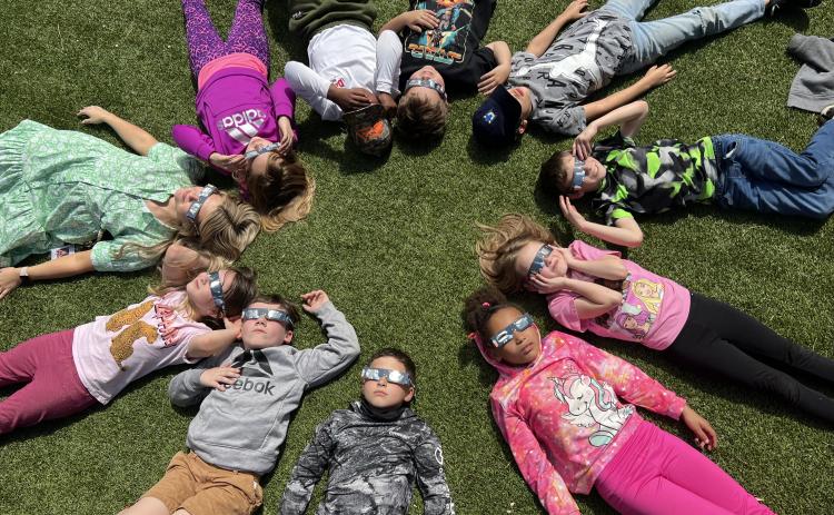 Ms. Westbrook’s 2nd grade class at South Hart Elementary School watching the eclipse. 