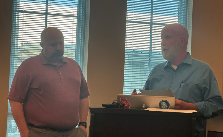Councilman Tray Hicks (right) and DDA Director Jason Ford  make a presentation on annexation. 