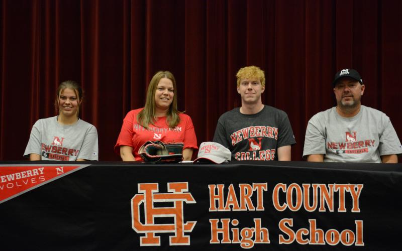 Avery Strickland (third from left) signs with Newberry College for baseball.