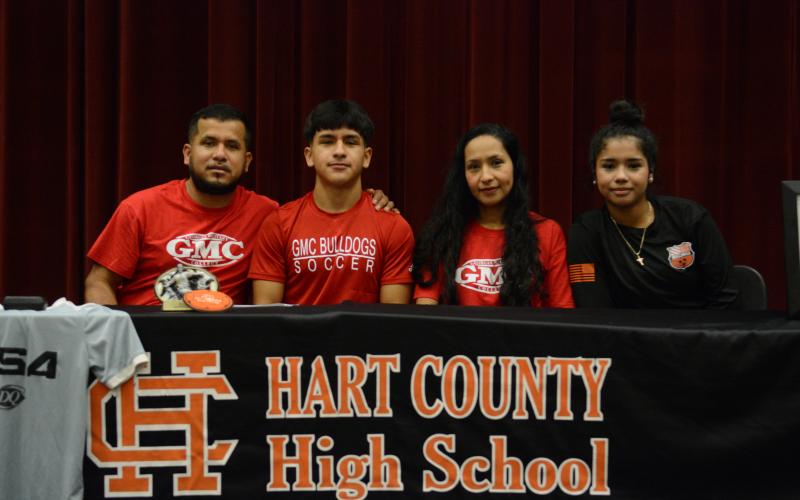 Axsel Fajardo-Bacillio (second to left) signs with Georgia Miltary College for soccer. 