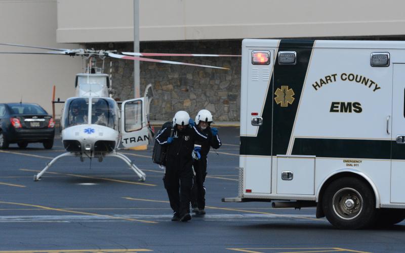 Helicopter Emergency Medical Service Technicians from LifeNet South Carolina touchdown in the Ingles parking lot near Belk to transport a victim from Monday’s horrific crash to Prisma Health in Greenville, S.C. Photo by Benjamin London
